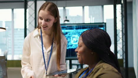 manager teaching young technician how to develop software using ai