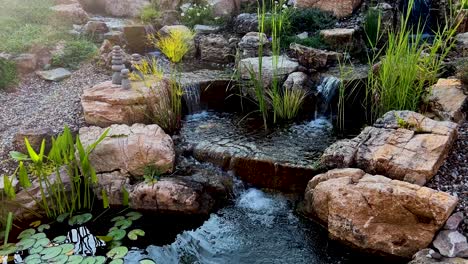 water trickling over rocks into small pool