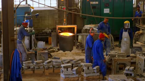 workers working in foundry workshop 4k