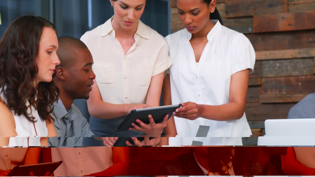 Business executives interacting with each other in meeting