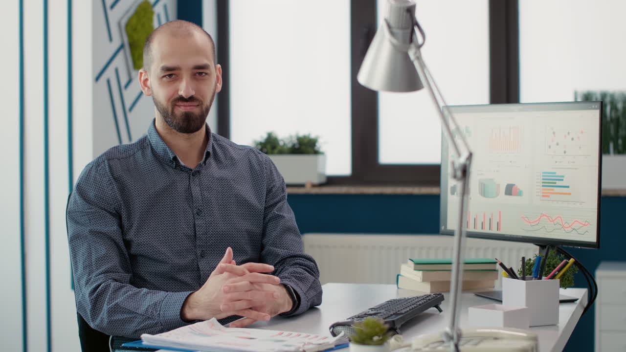 Chemist using online video call on computer in laboratory