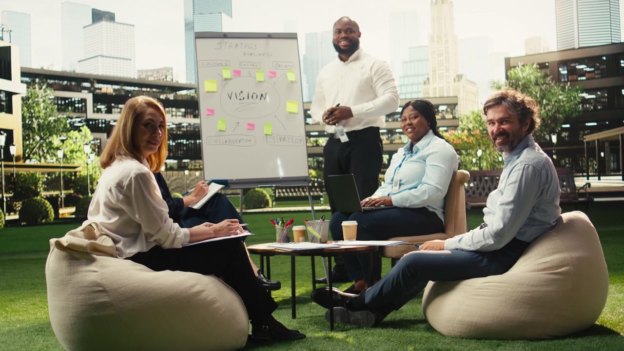 Diverse Business Team Collaborating in Modern Outdoor Office Space