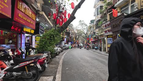 vibrant city street with pedestrians and scooters