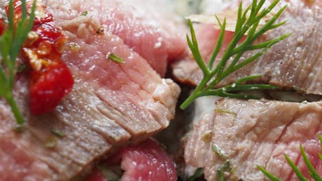 sliced beef with herbs and spices