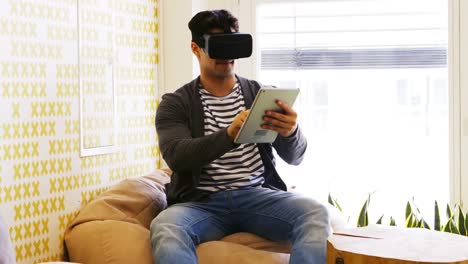 business executive using virtual reality headset and digital tablet
