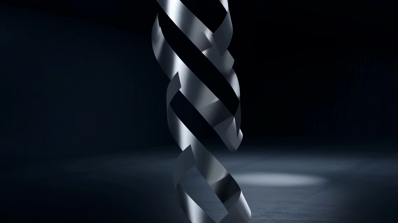 Interwoven silver strips turn steadily around center as glossy surfaces catch narrow beams of light, creating changing overlaps against a black background and subtly textured dark floor.