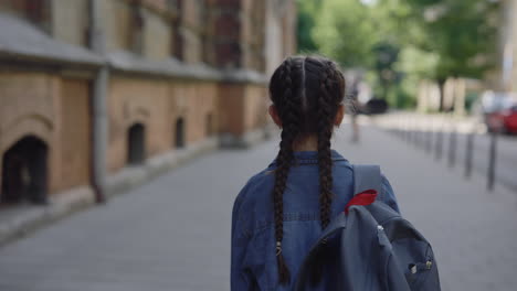 girl walking to school