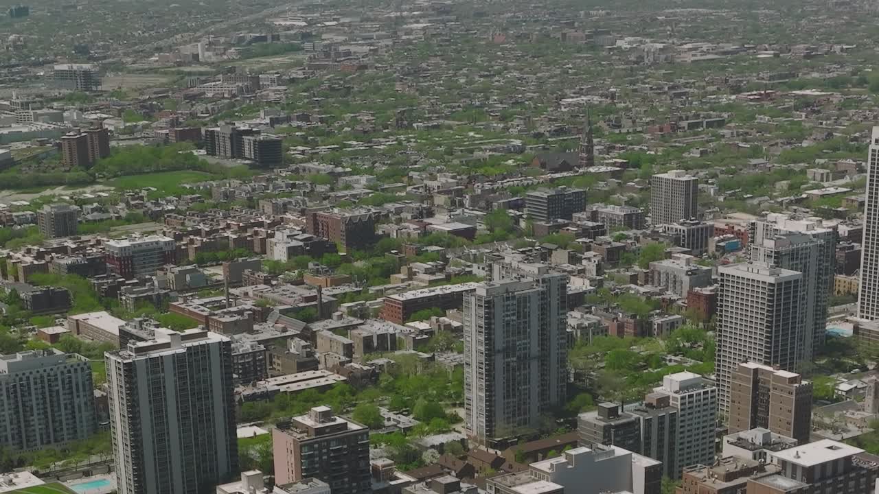 View of Chicago's urban landscape with green spaces during the day