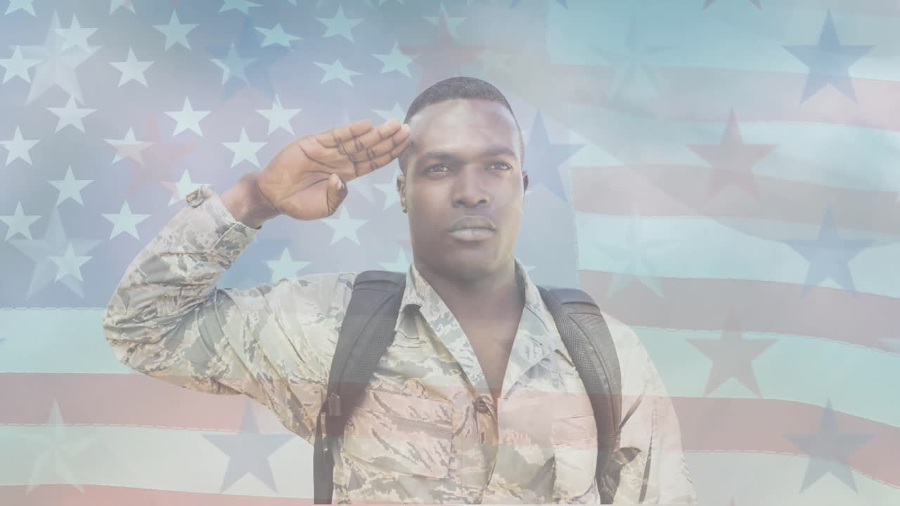 Animation of male soldier saluting moving over american flag