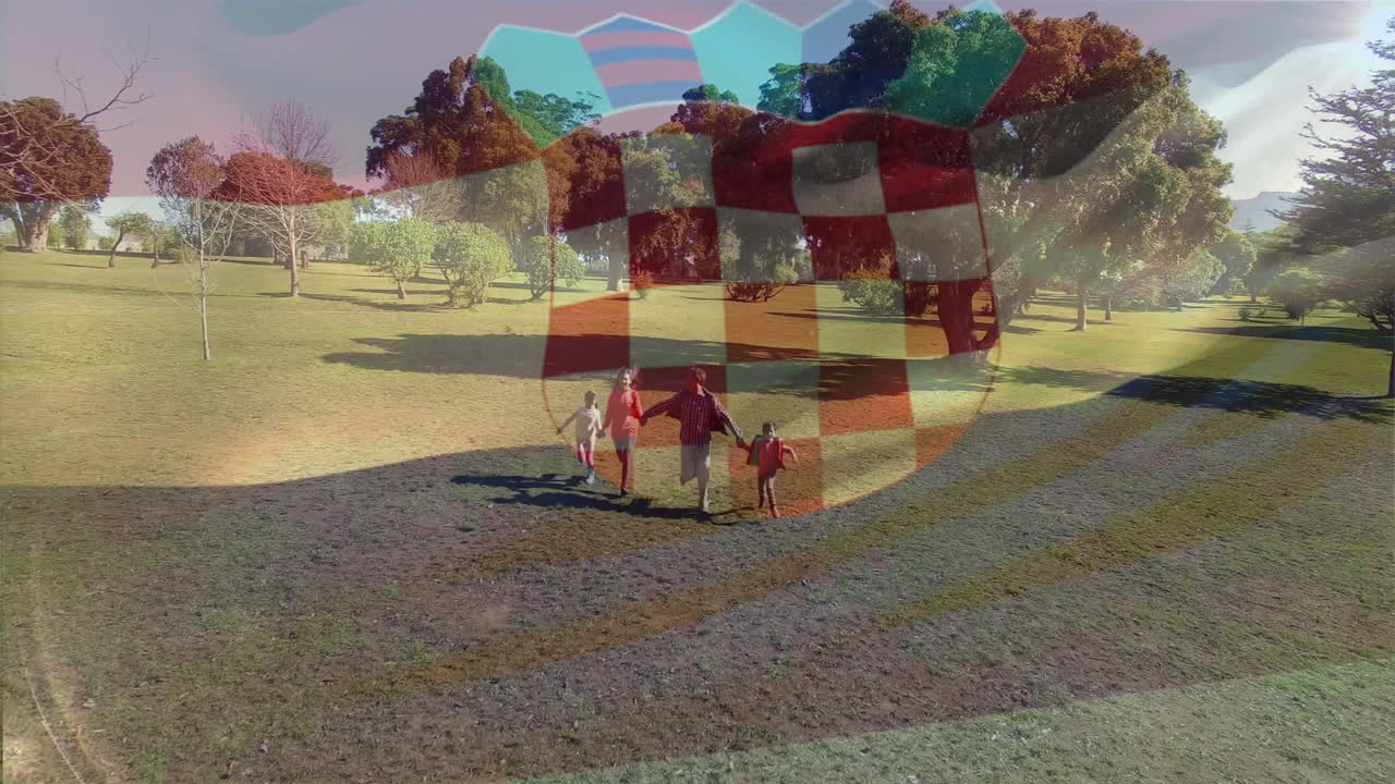 공원에서 달리는 카우카스 가족 위에 크로아티아 국기의 애니메이션