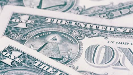 all seeing eye on the one dollar. the reverse side of the dollar denominations of 1 dollar rotate