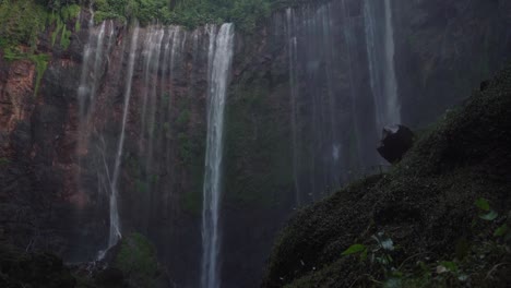 stunning beautiful view from the bottom base of famous tumpak sewu waterfall in east java indonesia