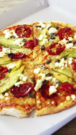 delicious pizza in pizza box