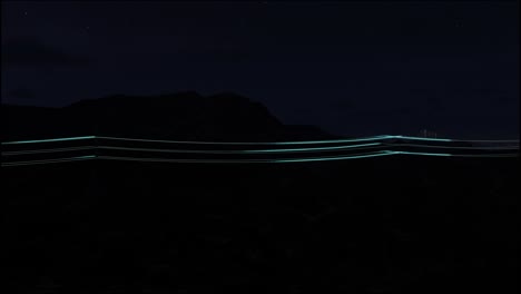 power transmission lines with 3d digital visualization of electricity. scenic footage with night sky full of bright stars. concept of renewable green energy and clean ecological environment