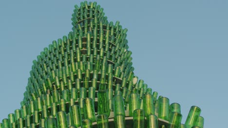 Statue-made-of-Sidra-bottles-in-Gijon,-Asturias,-Spain---Arbol-de-Sidra