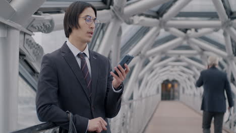 business people on a city bridge