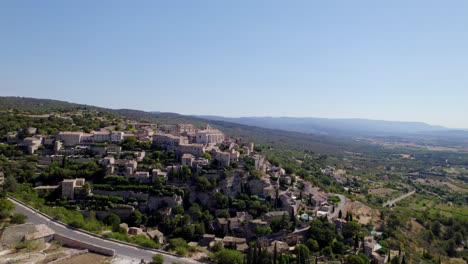 Toma-Aerea:-Dando-Vueltas-Alrededor-Del-Antiguo-Pueblo-De-Gordes,-Francia