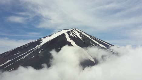 timelapse aerial view from the top of mount fuji with fast moving clouds