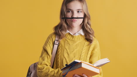 teenage caucasian girl student making funny faces.