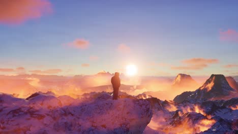 man contemplating sunset over snowy mountain peaks