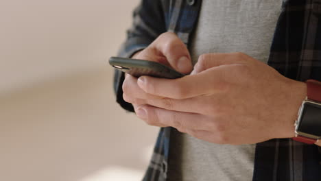 close-up-hands-using-smartphone-texting-typing-email-messages-browsing-social-media-communicating-online