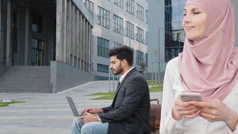 two people working outdoors