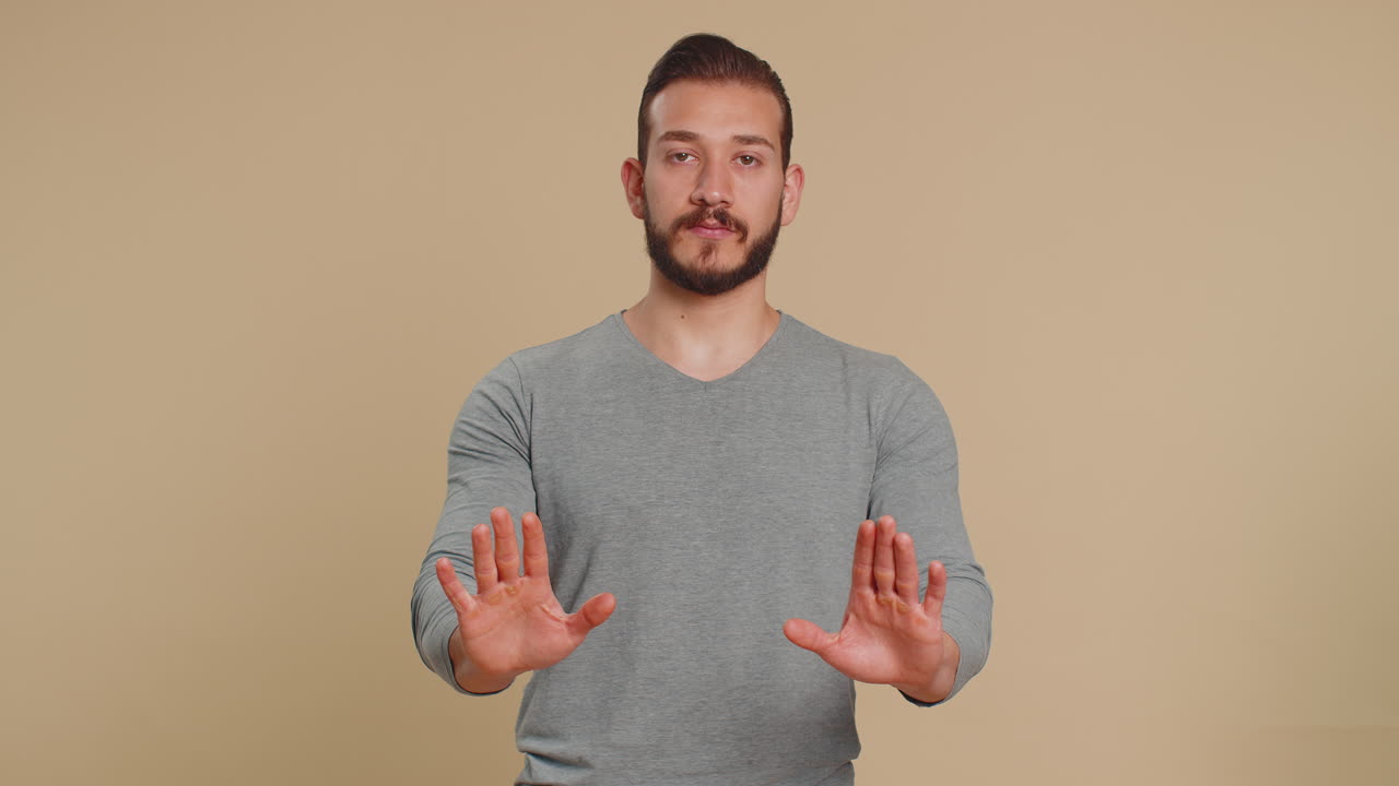 Lebanese man saying no be careful scolding and giving advice to avoid danger disapproval sign