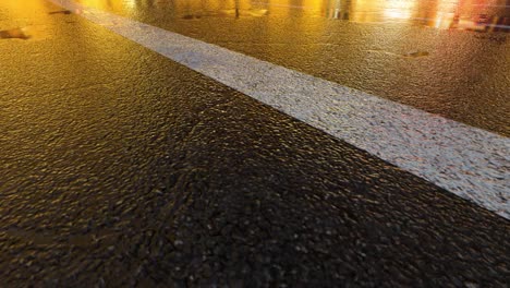 3d heavy rain hitting road at night - 4k realistic rain particle (loopable) - rainy day on a colorful street with traffic - wet road at night - low angle shot of in the rain - rainfall and reflection on road - loopable moving image - italy - florence