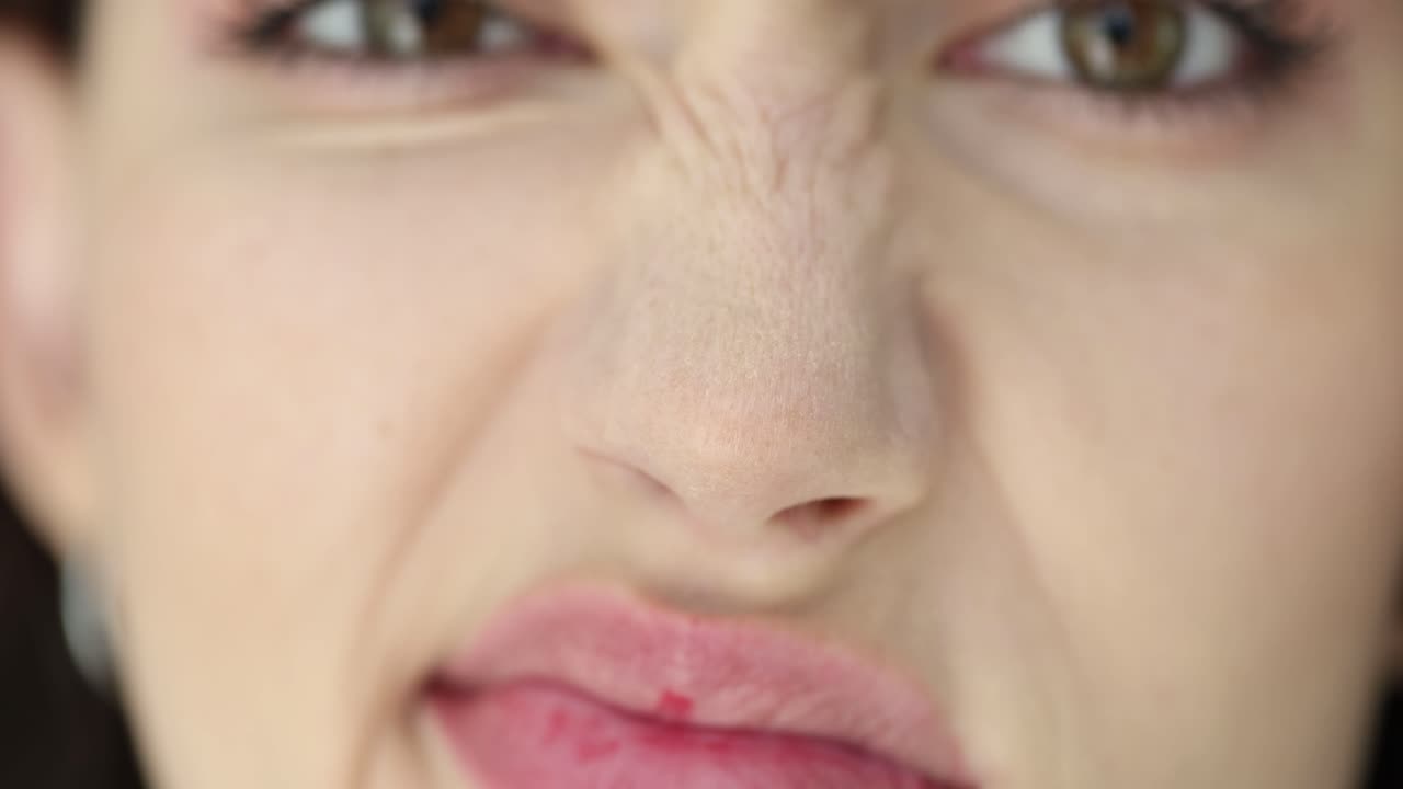 Woman with a disgusted expression