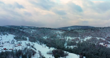 Sunset-At-Mountains-In-Winter-Aerial-View