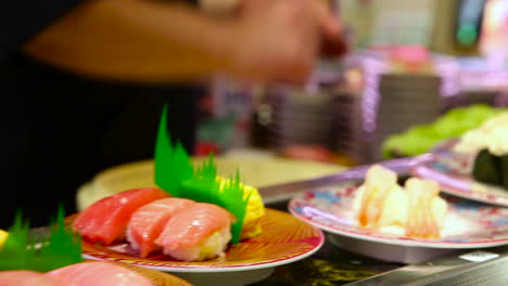 sushi items travel on a conveyor belt in a restaurant in china 3