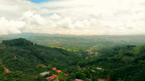 aerial drone fly over costa rica mountains afternoon