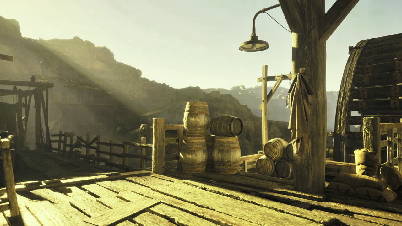 Rustic wooden dock bathed in sunlight with barrels and tools at sunset