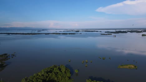 Aerial-view-of-wetland-area-submerged-in-flood-water-in-Bangladesh,-Sylhet