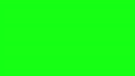 4k video of stack of gold bars and coins on green background.