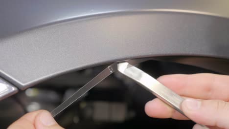 Close Up Cutting Transparent Film on Car&#039;s Exterior