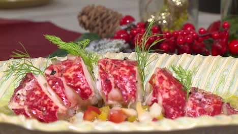 elegant lobster dish with festive decorations
