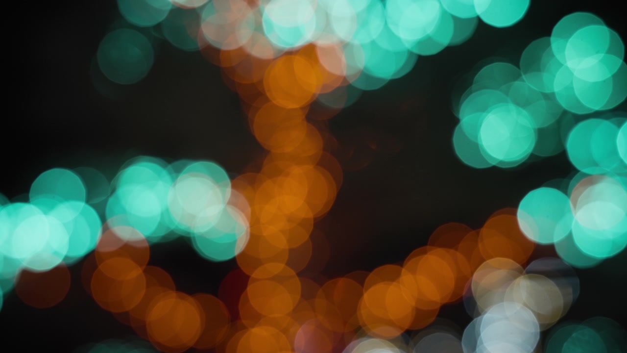 Teal and orange bokeh round lights