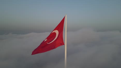 turkish flag on the fog camlica hill uskudar