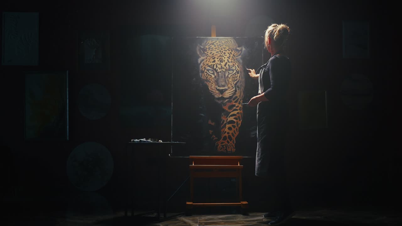 Woman Artist Painting a Jaguar