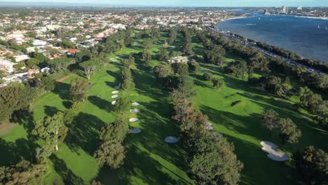 aerial flyover royal perth golf club during sunny day beside swan river in western australia