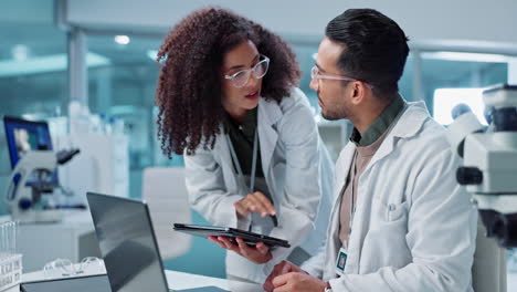 scientists collaborating in a laboratory