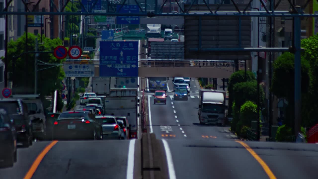 도쿄의 도시 거리에서 교통 체증의 타임 스 긴