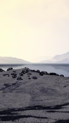 a serene landscape with mountains and a lake