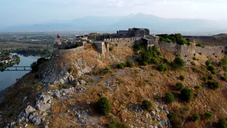 Aerial-of-Rozafa-medieval-castle-in-Shkoder,-Albania-in-the-morning-sun