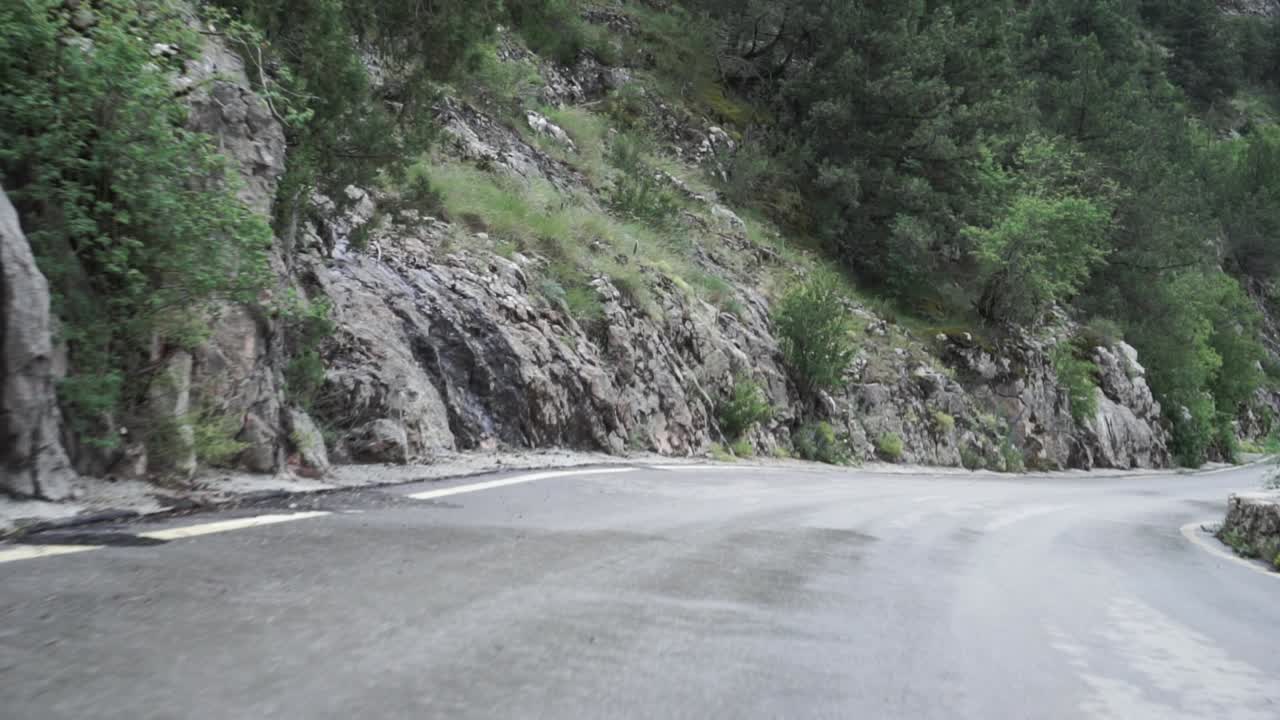 Motorcycle Ride Through Mountainous Scenery