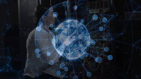female network engineer scanning servers in data center projecting hologram globe with cloud icons