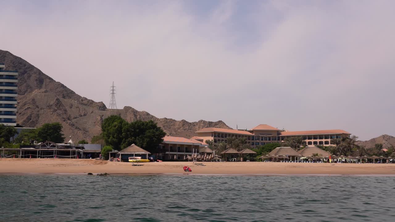 Premium stock video - Exterior shot of a beach resort in the fujariah ...