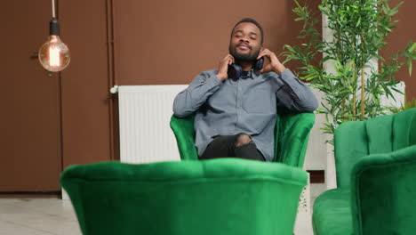 hotel guest enjoys music on headset