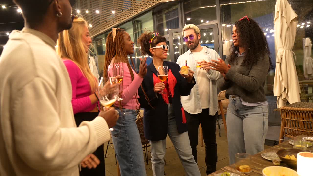Group of Friends Celebrating Outdoors at Night